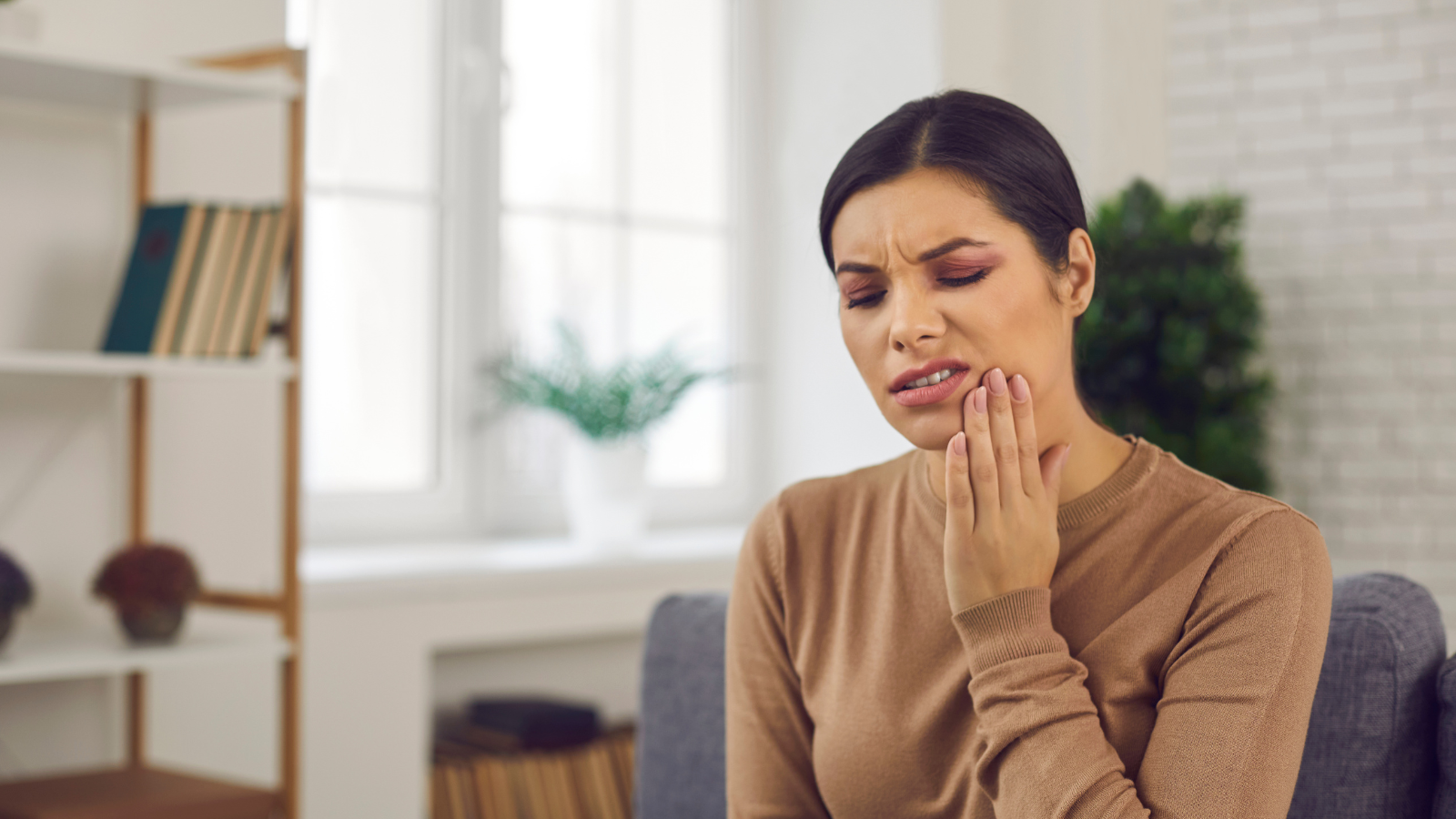 איך להקל על כאבי שיני בינה